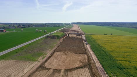 aerial view showcasing the expansive progress of a major road or highway under construction