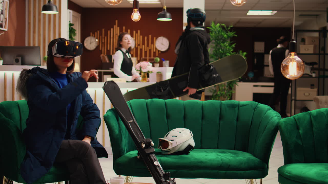 로비에서 vr 헤드셋을 사용하는 아시아 사람