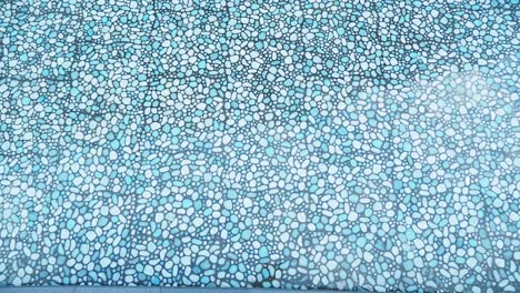abstract pebble pattern in blue and white