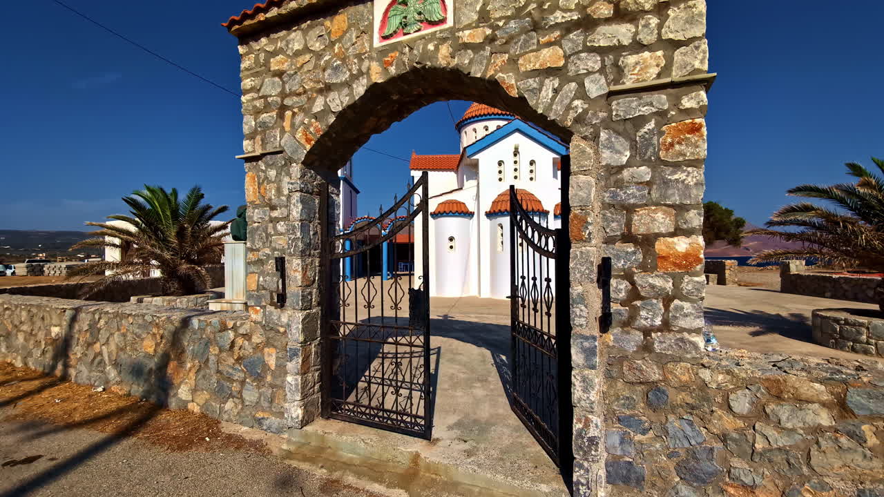 Coastal White Mediterranean traditional Church POV at Kissamos Port Greece, summer travel destination