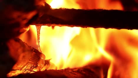 plastic burning and melting in an open fire place.
