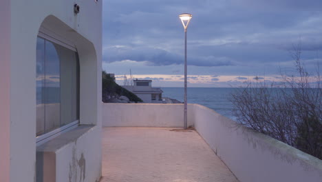 picturesque street view of a holiday village at the sea coast during an early morning