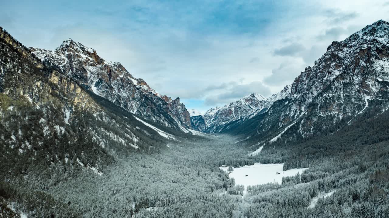 Flight over the valley to Pederu, in Fannes-Sennes natural park in South Tirol, Dolomites