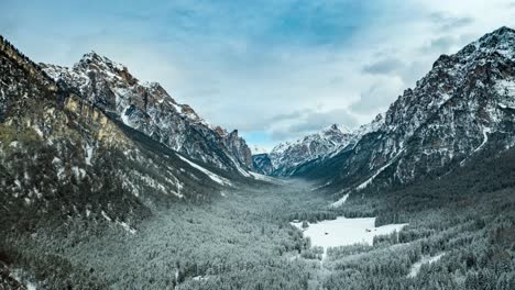 flight over the valley to pederu, in fannes-sennes natural park in south tirol, dolomites
