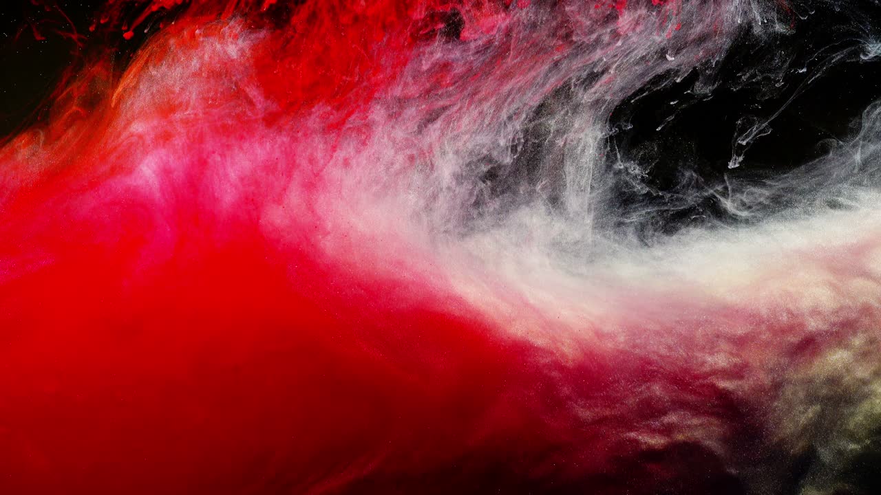 Abstract forms. Shooting on a black background. Mixing of paints