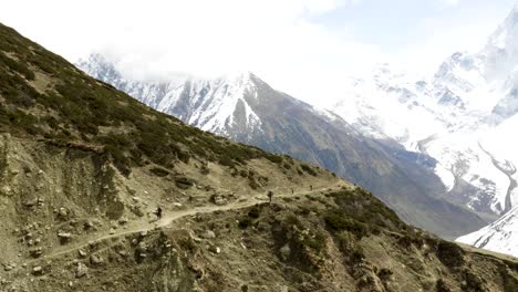 a lot of backpackers on the trekking larke pass in nepal. manaslu area.