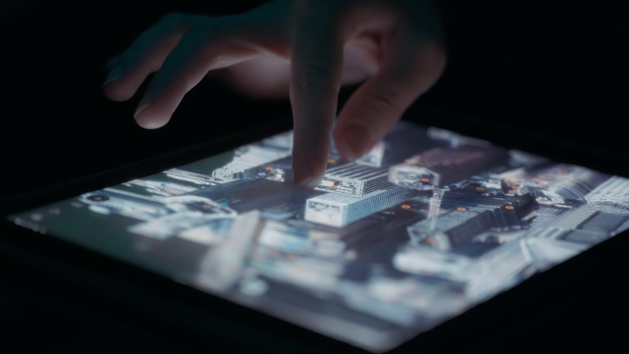 Person exploring satellite 3D view of a city map, looking at buildings