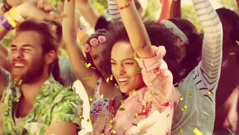 Animation-of-gold-confetti-falling-over-crowd-of-people-having-fun-at-music-concert