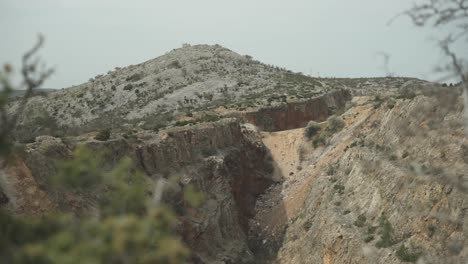 rugged desert mountainside, arid countryside landscape in summer heat