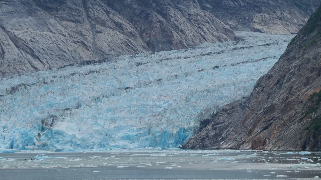 Alaska Cruise vacation in the summer. Scenic cruising at the Dawes Glacier, Endicott Arm fjord.