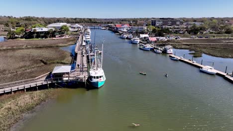 shem-creek-aerial-push-in-over-shrimp-trawlers-near-charleston-sc,-south-carolina