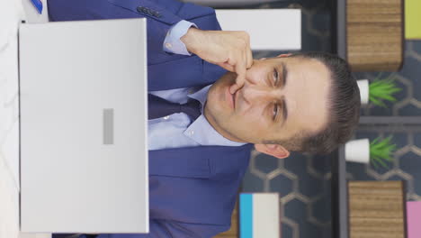 Vertical-video-of-Businessman-biting-his-nails.