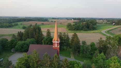 aerial view of a church and rural farmland