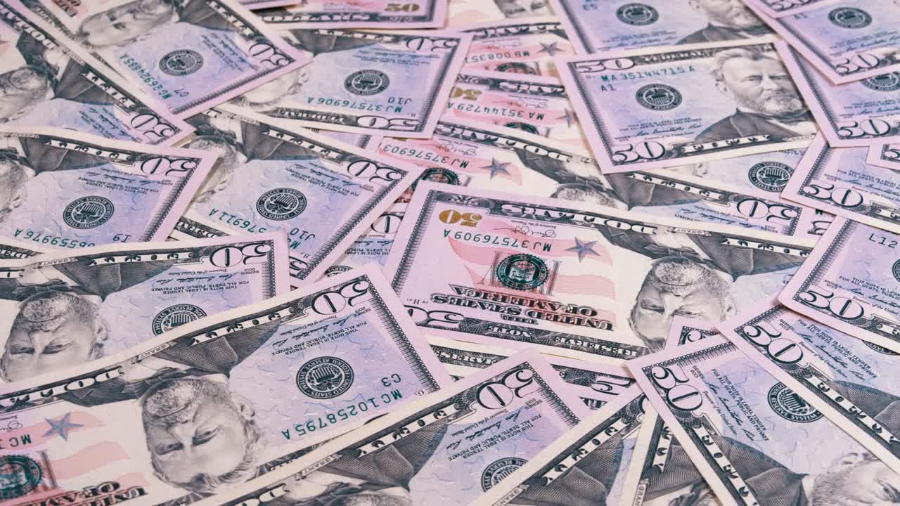 fondo de los billetes estadounidenses de valor de 50 dólares girar