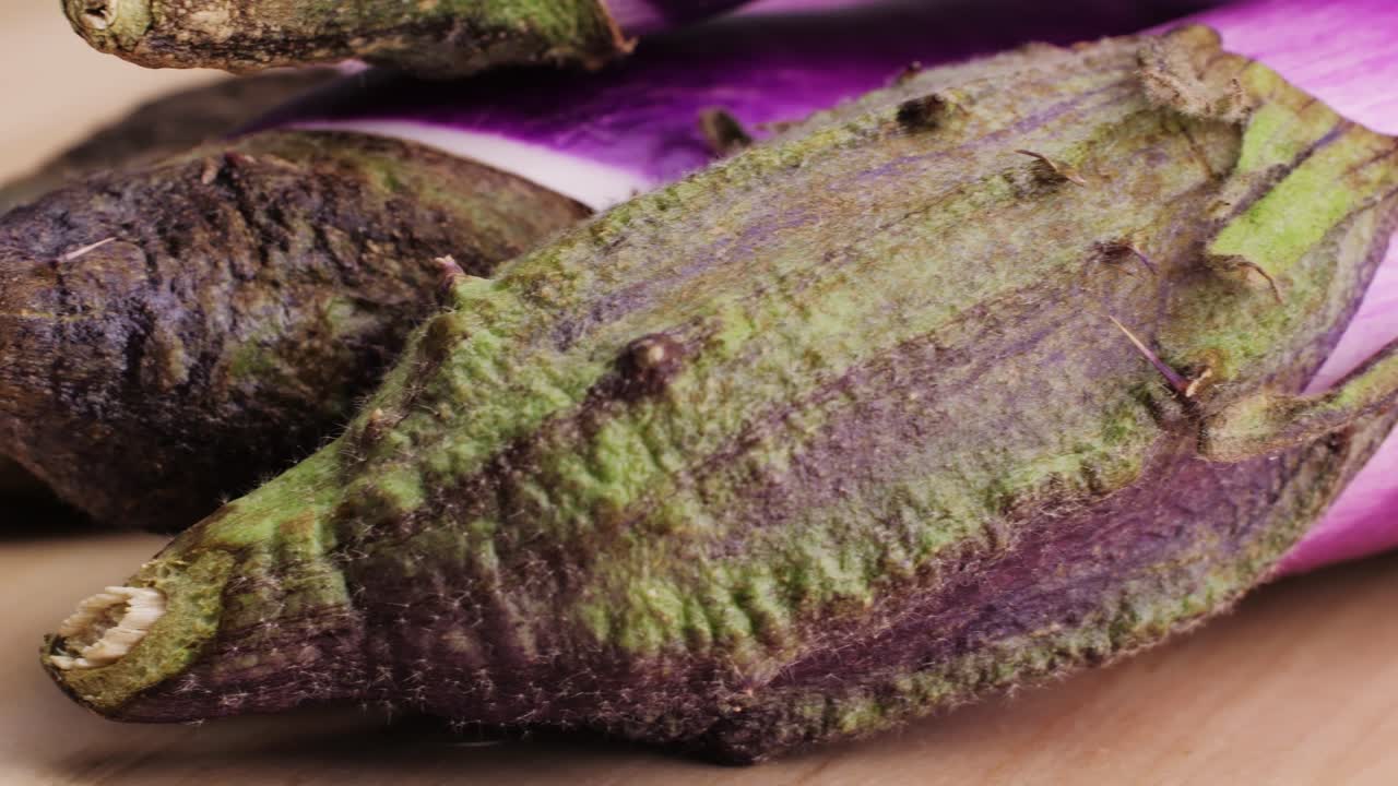 Close-up view of purple eggplants