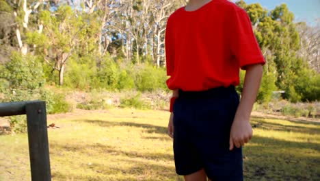 determined boy walking on obstacle