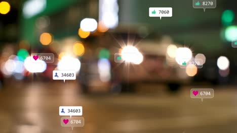 소셜 미디어 아이콘과 숫자의 애니메이션 초점이 맞지 않는 도시 불빛