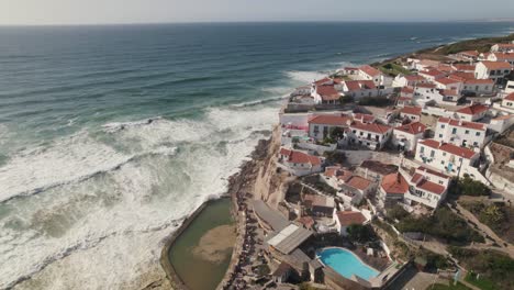 White-houses-tumbling-down-to-the-Atlantic,-picturesque-town-of-Azenhas-do-Mar,-Sintra,-Portugal