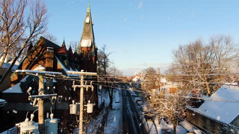 AERIAL-Downtown-Intercourse,-Pennsylvania-USA-During-Snowfall-On-Winters-Day