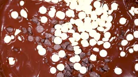 white chips blend into dark chocolate mixture