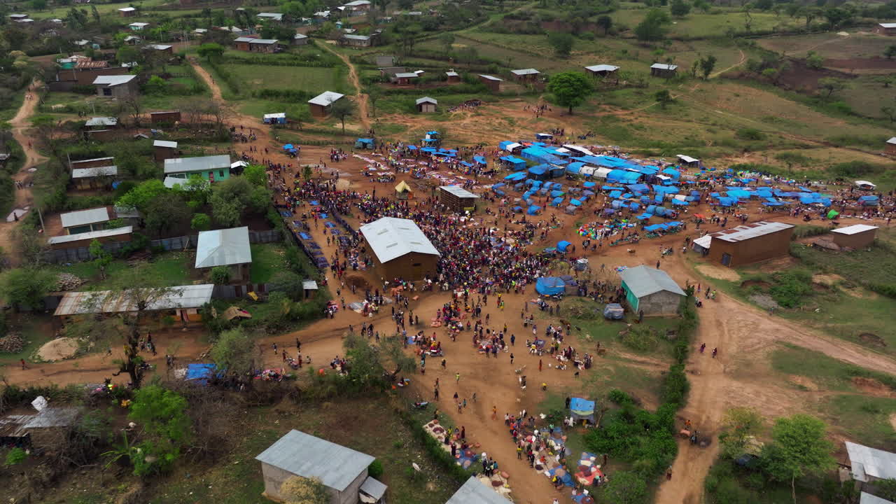 Kako tribal villagers seen from the air on market day