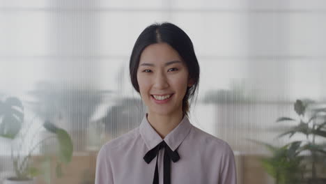 portrait young asian business woman intern smiling cheerful enjoying professional career beautiful ethnic female in office slow motion