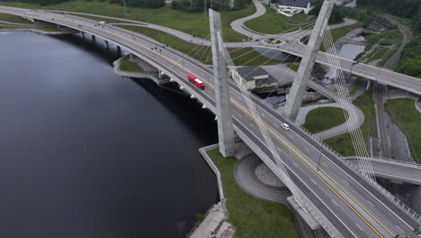 farris bridge with traveling vehicles in larvik, norway - aerial drone shot