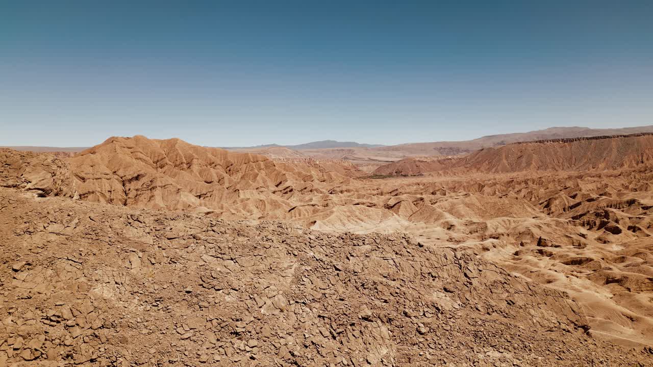 Experience the captivating allure of Atacama's otherworldly landscape with breathtaking drone footage, revealing the rugged rock formations and endless horizons of the desert