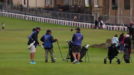 golfers preparing for a shot on the course