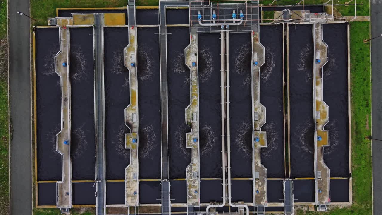 Water treatment facility with multiple tanks and pipes