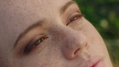 close up portrait beautiful red head woman opening eyes meditating at sunset praying exploring spiritual lifestyle enjoying mindfulness