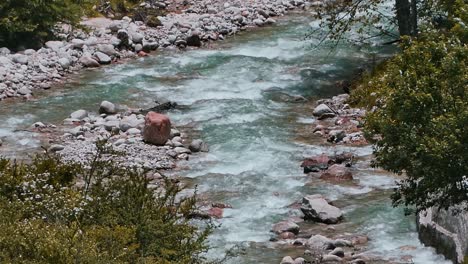 ganga river flowing in a himalayan indian village of harshal , uttarakhand