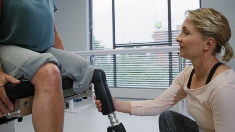 woman with prosthetic leg at hospital