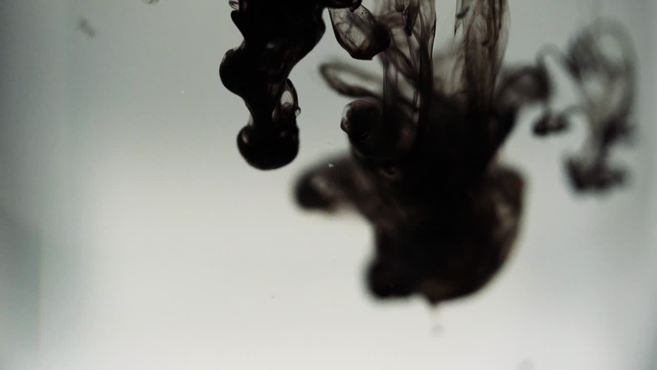 Paint floating in water looking like majestic nebulas. Stable shot with the Sony a7iii