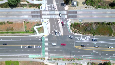 top-down drone video of a road intersection timelapse california