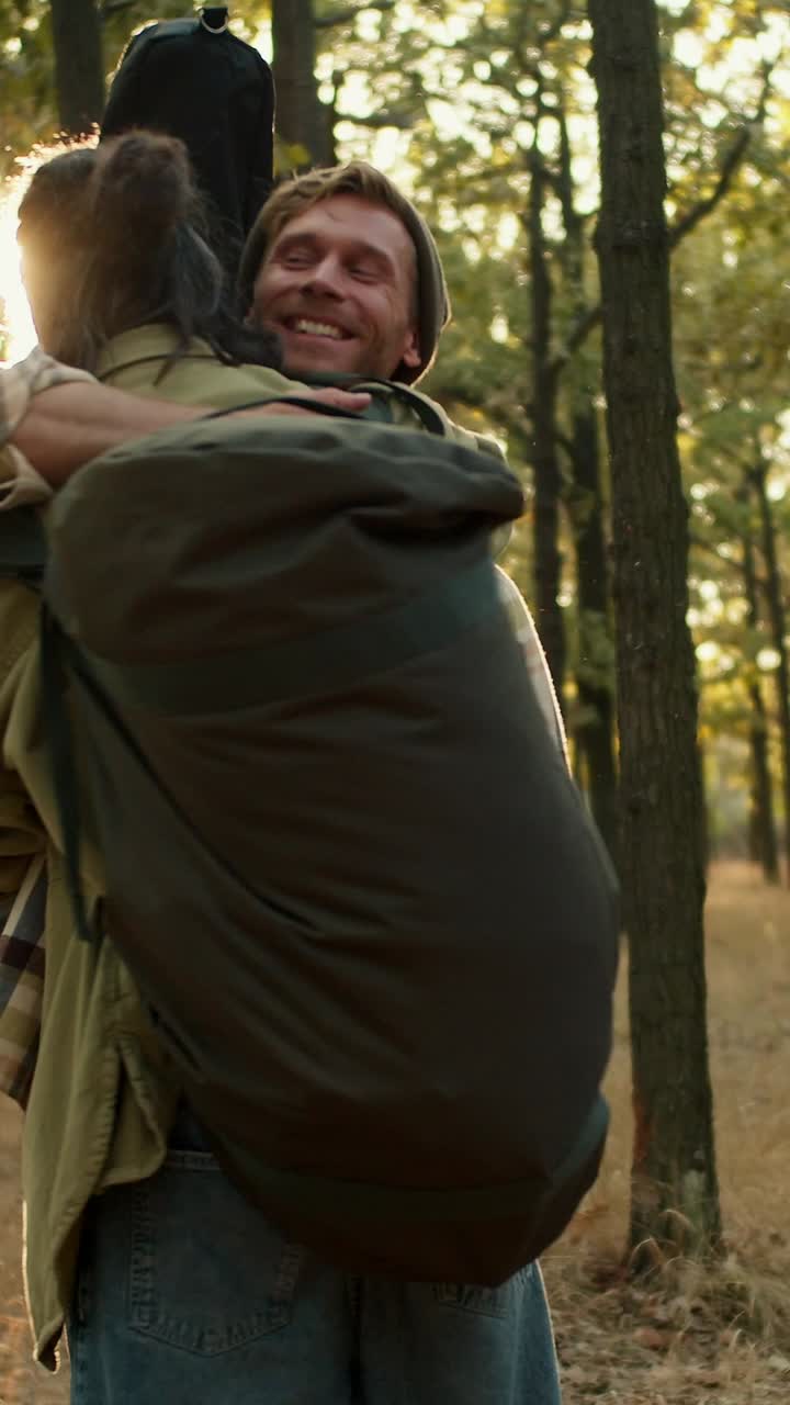 Happy Couple Hugging in a Forest