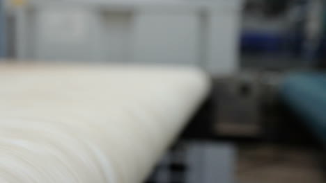 production line in woodworking factory. manufacture of flooring, parquet processing