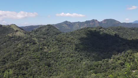 Camera-pan-showing-a-mountainous-area-with-beautiful-green-tones