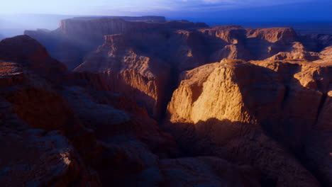 dramatic canyon landscape bathed in golden light