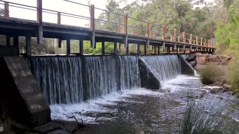 Water-Flowing-Over-Barrett-Street-Weir-Pan-Right-Clip,-Margaret-River---Western-Australia