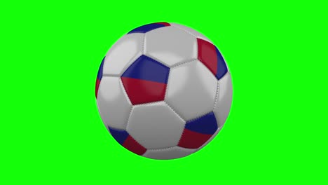 pelota de fútbol con bandera de haití en clave de croma verde, bucle