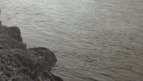 River-bank-rocks-on-the-Norfork-river-near-Mountain-Home-Arkansas-USA