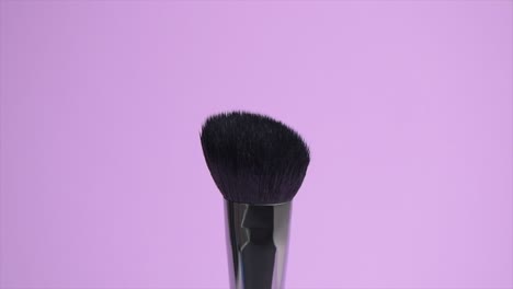 close-up of a black cosmetic brush.