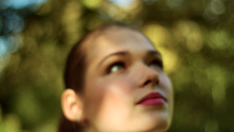 woman looking up in nature