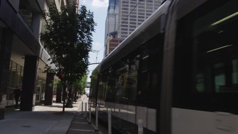 beautiful kansas city streetcar stop in the summer.