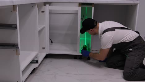 cabinet installation with laser level