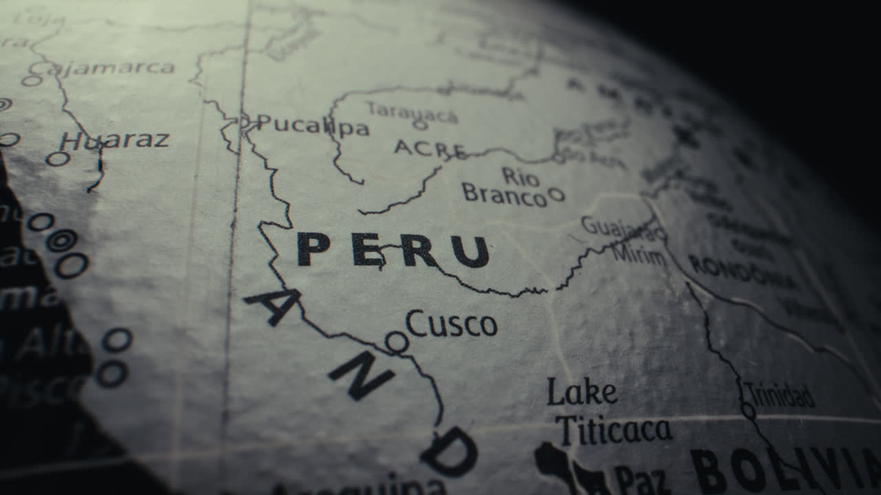 Close-up of a World Globe, Focusing on Peru and Bolivia