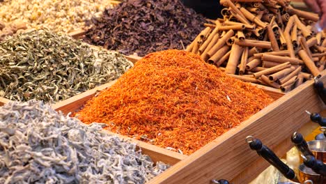 spices and herbs for sale at a market stall