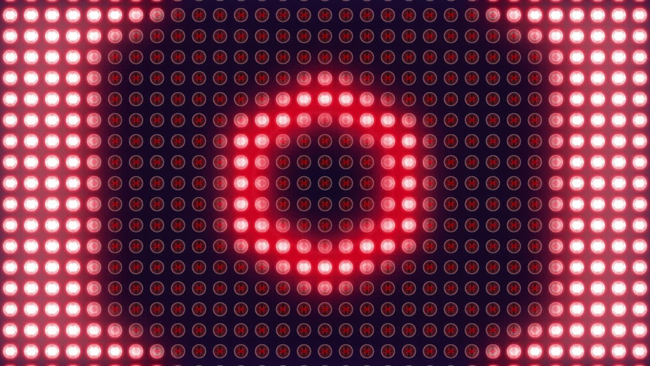 Animation of light spots forming shapes on black background