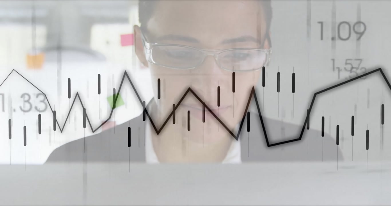 Woman opening laptop, viewing transparent overlay charts pulsing while analyzing financial data